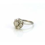 A diamond floral cluster ring
