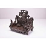 A late 19th century bronze desk standish