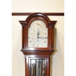 An Edwardian mahogany musical longcase clock
