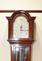 An Edwardian mahogany musical longcase clock