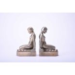 A pair of Art Deco gilt spelter figural bookends