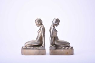 A pair of Art Deco gilt spelter figural bookends