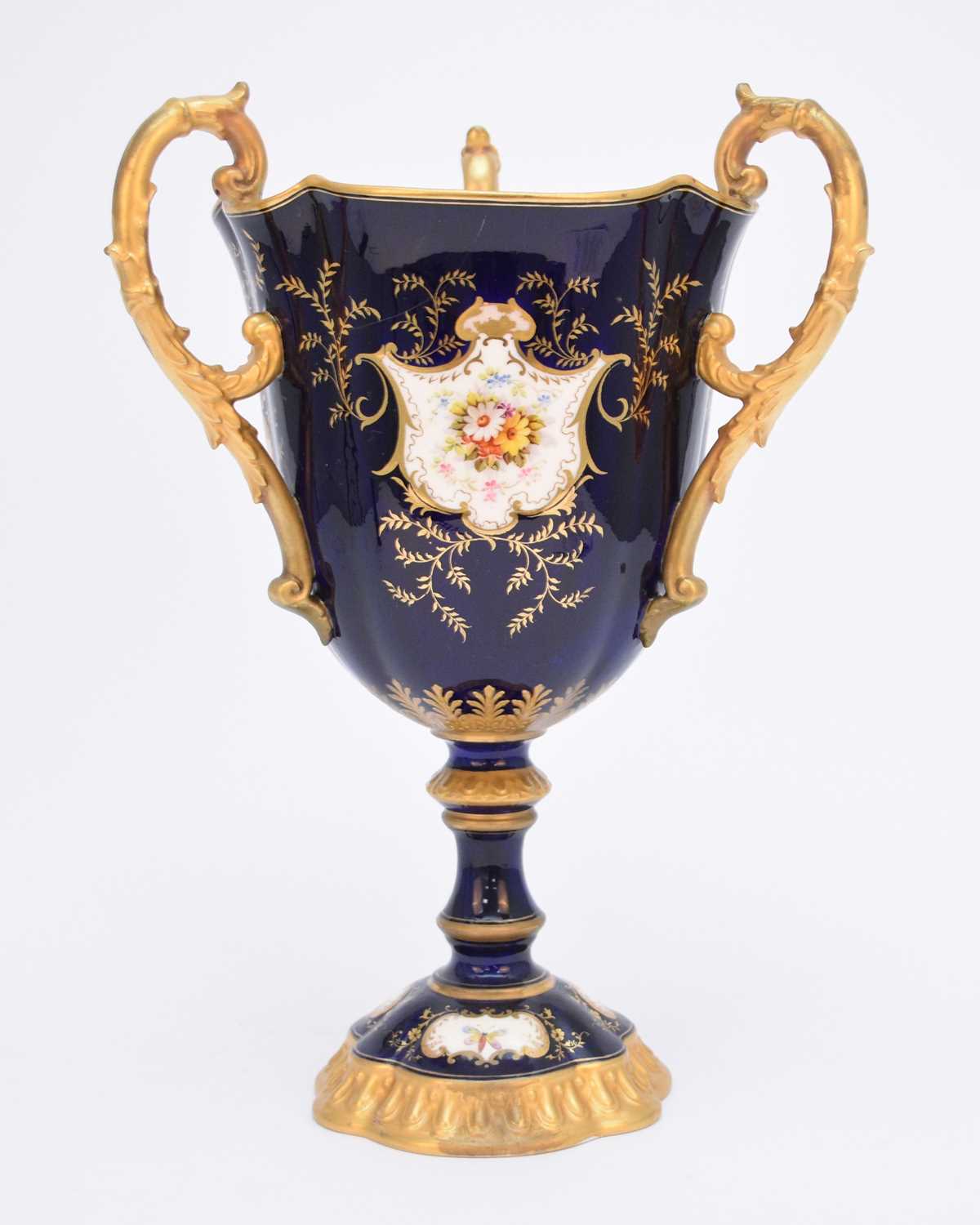 Large Coalport trophy cup with three handles, late 19th/early 20th century