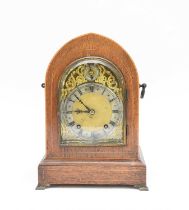 An early 20th century lancet top inlaid rosewood bracket clock