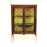 An Edwardian inlaid mahogany glazed display cabinet