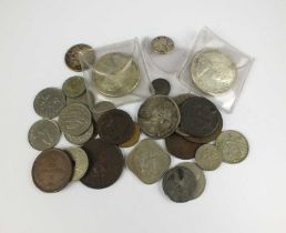 An assorted collection of foreign silver, cupro-nickel, copper and bronze coinage