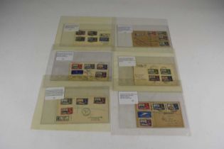 Album containing 17 covers with George V Silver Jubilee Stamps, mostly sets, some FDCs.