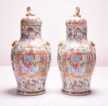A pair of Chinese Canton famille rose porcelain vases and covers, 19th century