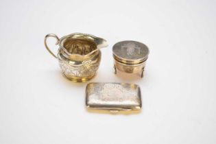 A silver trinket box, cream jug and cigarette case