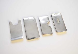 A silver vesta case and three card cases