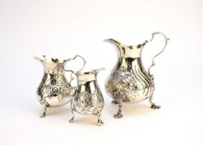 Three silver cream jugs