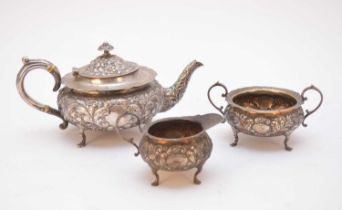 A matched three piece silver tea service