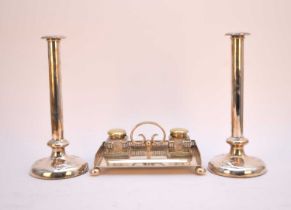 A plated ink stand and a pair of plated candlesticks