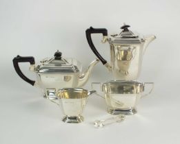 A four piece silver tea service