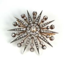 A Victorian diamond star burst brooch pendant