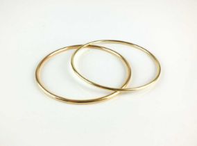 Two 18ct gold bangles