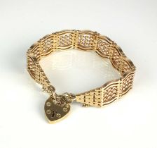 A 9ct gold fancy gate link bracelet
