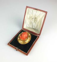 A 19th century carved coral cameo brooch