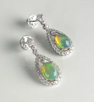 A pair of 18ct white gold opal and diamond earrings