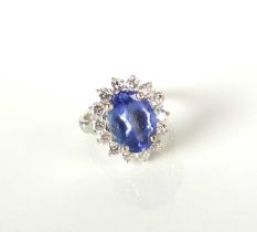 A tanzanite and diamond oval cluster ring