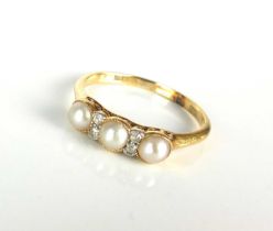 An early 20th century untested pearl and diamond ring