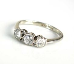 A graduated three stone diamond ring