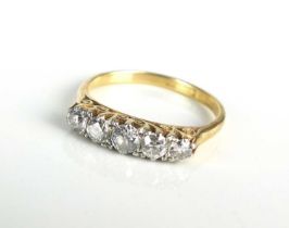 A graduated five stone diamond ring