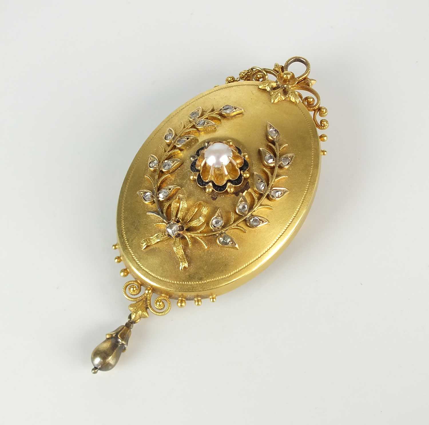 A late 19th/early 20th century diamond and pearl mourning locket / brooch