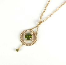 An early 20th century peridot and seed pearl pendant on chain