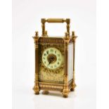 A French early 20th century brass carriage timepiece