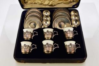 Unusual Coalport silver-mounted coffee set with saucers and spoon or cigar holders