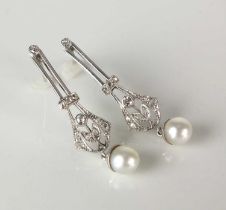 A pair of early 20th century style diamond and cultured pearl ear pendants