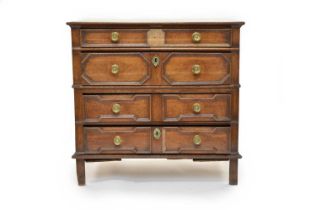 A Jacobean oak chest of four drawers