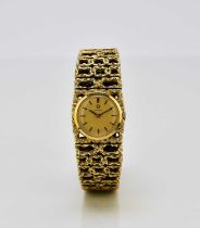 Omega: A lady's 18ct gold bracelet watch
