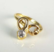 An early 20th century diamond set snake ring