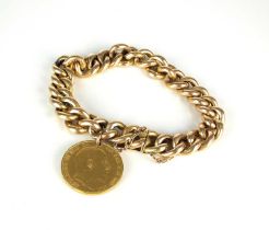 A yellow metal hollow curb link bracelet with attached sovereign