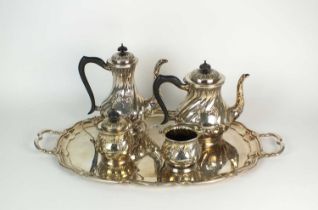 A four piece silver tea service and plated tray