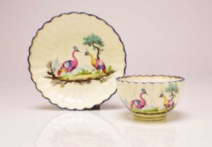 Caughley polychrome tea bowl and saucer painted with Fancy Birds, circa 1783-93