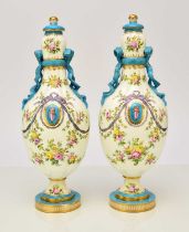 A pair of Coalport ribbon vases and covers, circa 1860