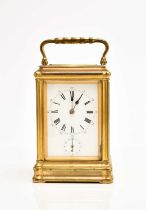 A late 19th century French gilt brass Grand Sonnerie carriage clock with repeat and alarm