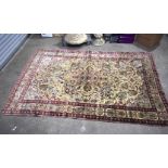 A large Oriental rug. 303 x 192cm.
