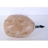 A carved marble boulder possibly a section of a larger feature 10 x 19 cm