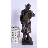 AN ANTIQUE BRONZE FIGURE OF AN ACCORDION PLAYER by Pommier. 28 cm high.
