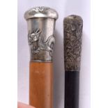 TWO 19TH CENTURY CHINESE SILVER WALKING CANES. 88 cm long. (2)