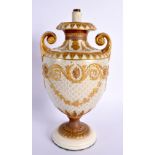 A FINE 19TH CENTURY TWIN HANDLED EUROPEAN PORCELAIN EMPIRE VASE decorated in raised relief with swag