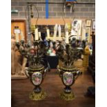 A PAIR OF 19TH CENTURY FRENCH PORCELAIN AND BRONZE CANDLE STICK LAMPS. 65 cm x 25 cm.