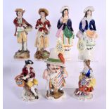 A PAIR OF DRESDEN PORCELAIN FIGURES together with Staffordshire figures. Largest 20 cm high. (7)