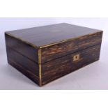 AN ANTIQUE COROMANDEL TRAVELLING BOX with partially fitted silver interior. 34 cm x 24 cm.