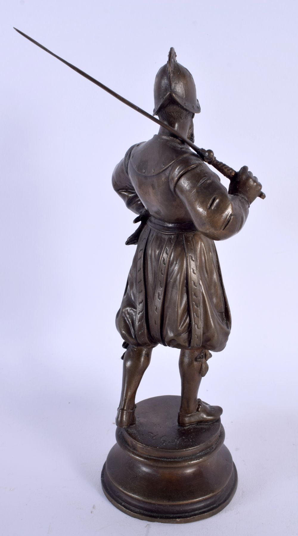 AN ANTIQUE FRENCH BRONZE FIGURE OF A MEDIEVAL SOLDIER modelled holding a sword. 23 cm high. - Image 3 of 4