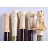 FIVE CONTINENTAL CARVED BONE WALKING CANES. 90 cm long. (5)